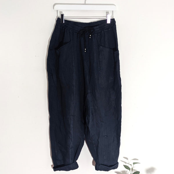 Plain linen low crotch trousers with front pockets