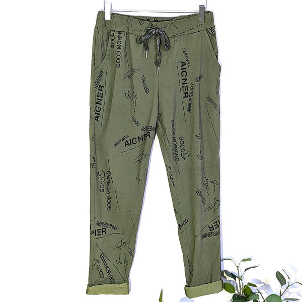Super stretch trousers with random writing (M)