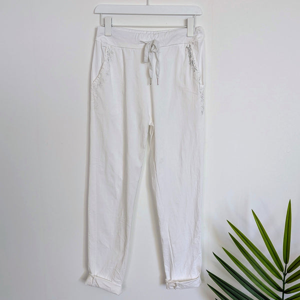 Super stretch trousers with silver brush stroke detail on pockets (M-L)
