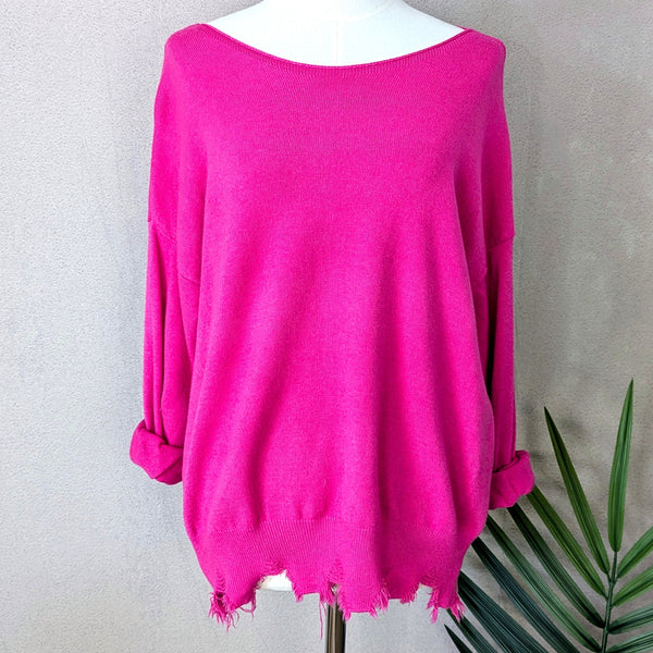 Super soft jumper with fashionable distressed hem line (S-M)