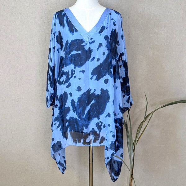 Roomy enlarged dalmatian style animal print silk blend v-neck top with satin edge fabric neckline