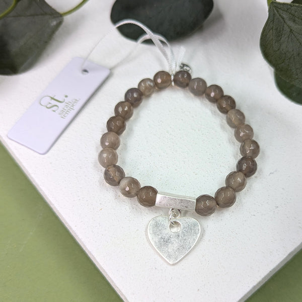 Facetted agate stretchy bracelet with bar and heart charm