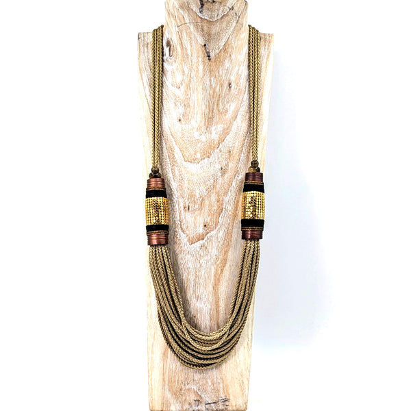 Luxury long multistrand cord necklace with bronze barrel component and resin