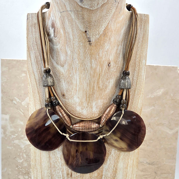 Luxe black triple shell component necklace with 'Murano' glass style feature