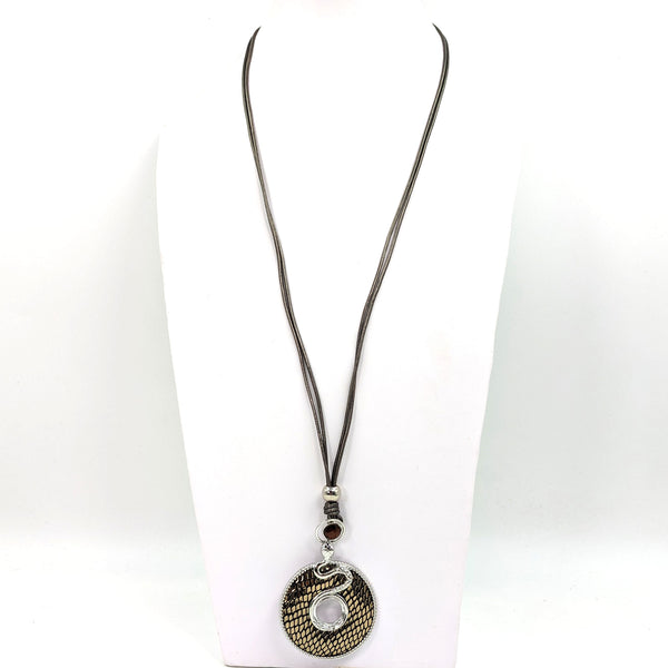 Serpent inspired pendant with stone on long leather necklace