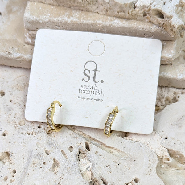 Snug triangular hoop earrings with baguette CZ section