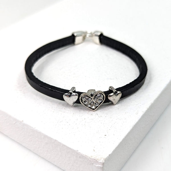 Leather bracelet w/ hearts feature