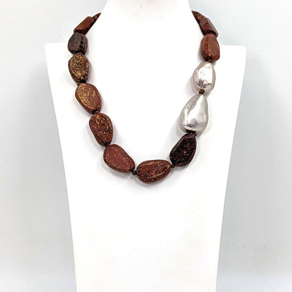 Random cut shape mottled wood bead necklace with pearl accent