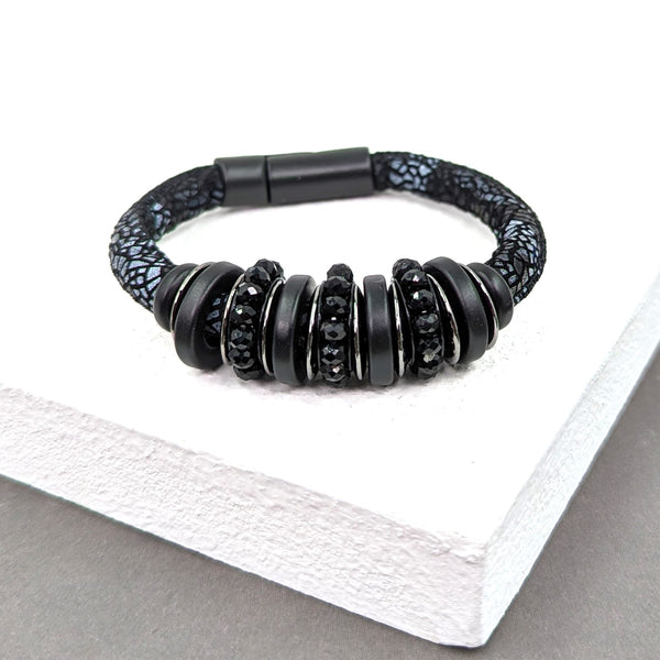 Statement patterned cord bracelet w/crystal rings detail