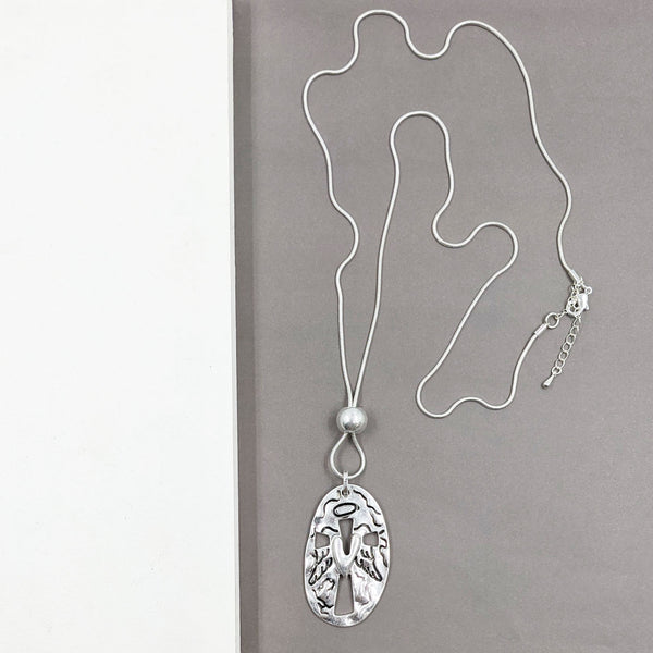 Angel pattern pendant with heart detail on long snake chain