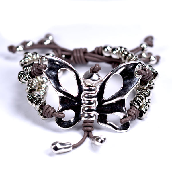 Handmade butterfly component with silver beaded sections leather bracelet