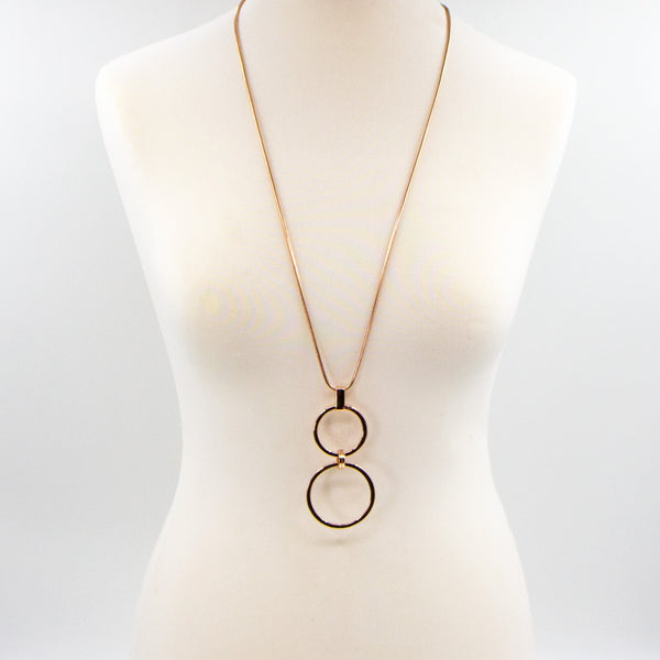 Long snake chain necklace with double ring pendant