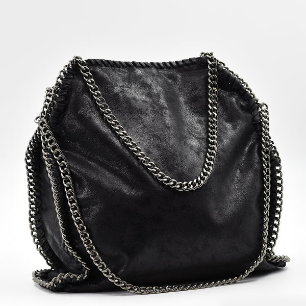 Stylish handbag with statement heavy curb chain handles