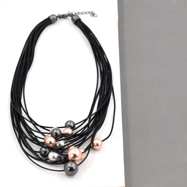 Multi strand black cord necklace with bead pendants