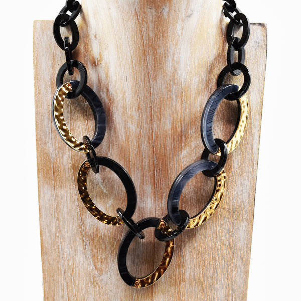 Brown short oval resin statement necklace with semi gold com