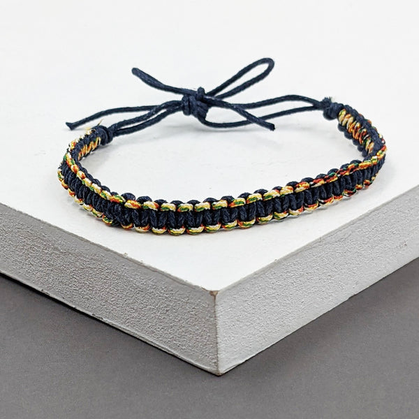 Delicate friendship bracelet with coloured bead edging