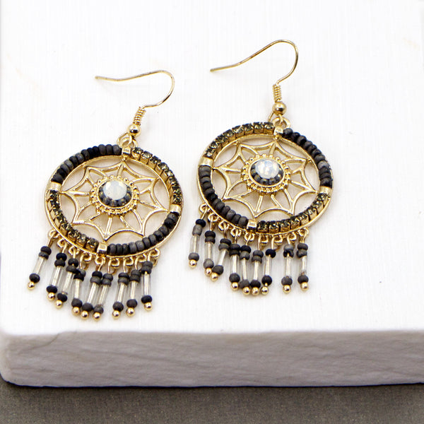 Open circle with crystal and bead tassel boho style earrings