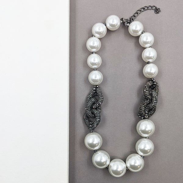 Chunky pearl statement necklace with crystal encrusted links detail