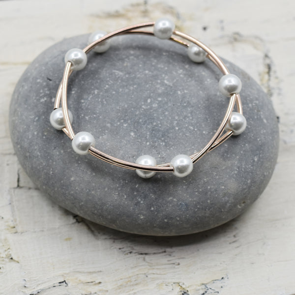 Stretchy rose gold and pearl bracelet duo