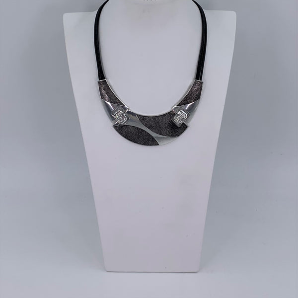 Silver statement section on black collar necklace