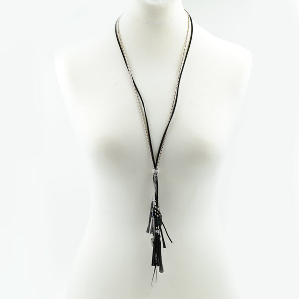 Multi tassel long necklace on varied cord