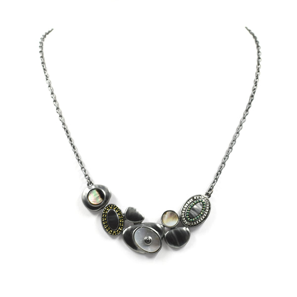 Multi organic shapes on short necklace with inlay feature