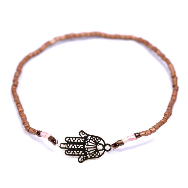 Delicate beaded bracelet with Hamsa hand shaped detail