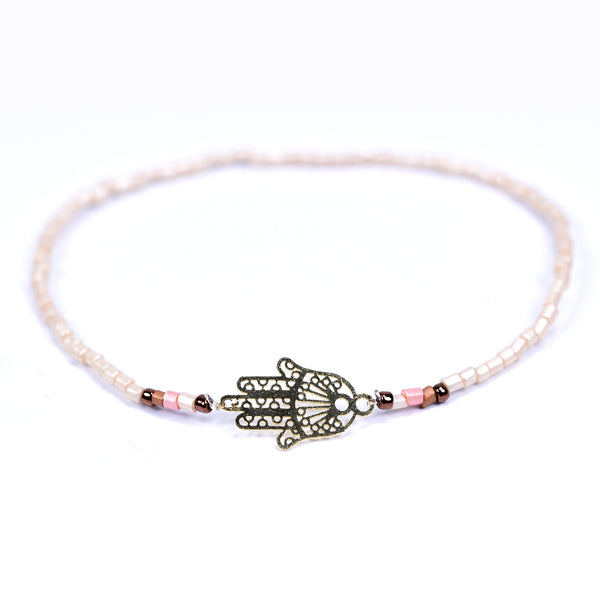 Delicate beaded bracelet with Hamsa hand shaped detail