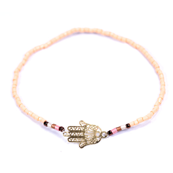 Delicate beaded bracelet with Hamsa hand shaped detail