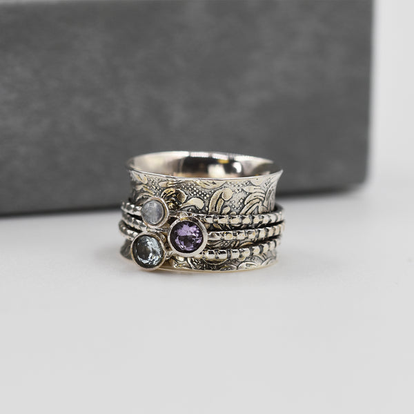 925 Silver patterned band ring with blue topaz, moonstone and amethyst spinning bands - Size 6