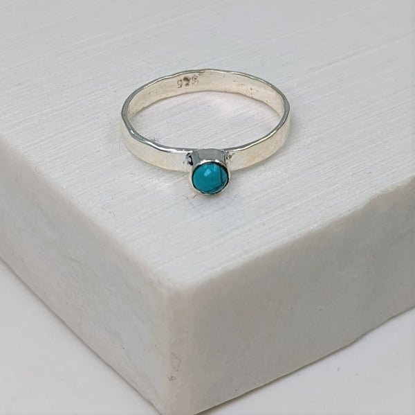 Soft hammered sterling silver ring with turquoise stone