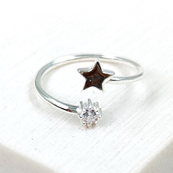 Open 925 silver ring with little star and CZ