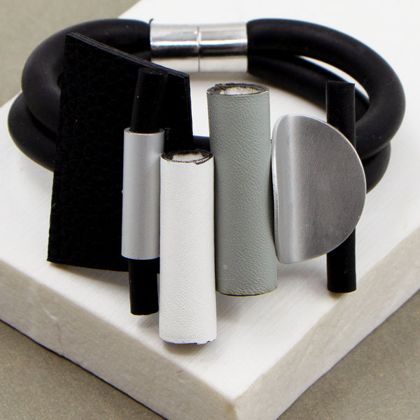 Contemporary neoprene multi tube bracelet with magnetic clasp