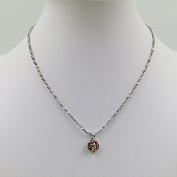 Delicate two tone necklace with circle feature