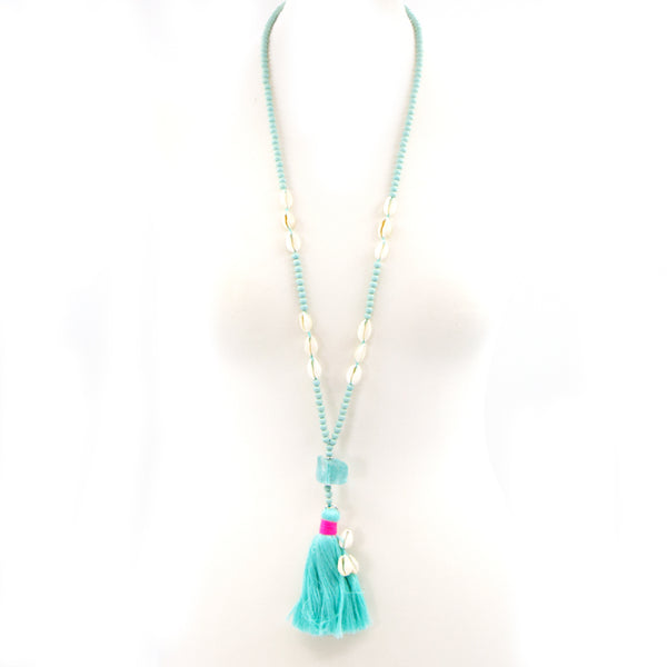 Long turquoise bead and shell necklace with tassle feature
