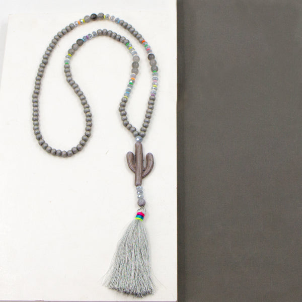 Long beaded muted necklace with soap stone cactus pendant