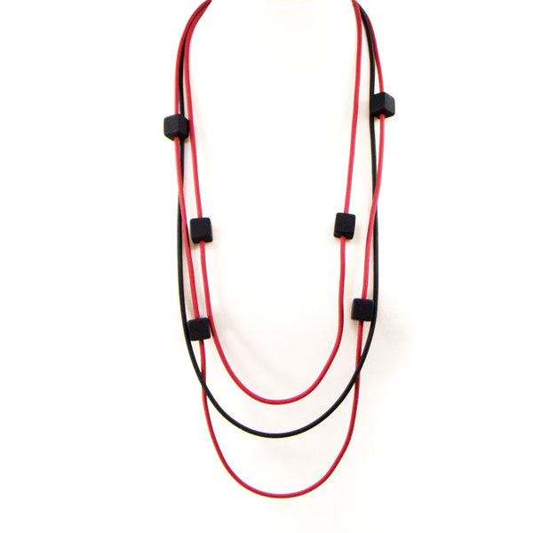 Multistrand neoprene necklace with square beads