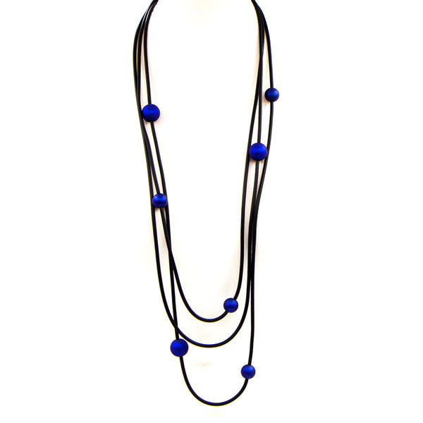 Triple strand long neoprene necklace with matte blue beads