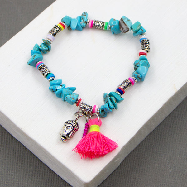 Stretchy beaded chip bracelet with tassle and buddha charm