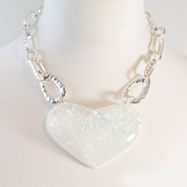 Heart shape iridescent pendant on chain link necklace