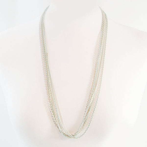 Long delicate multi strand necklace