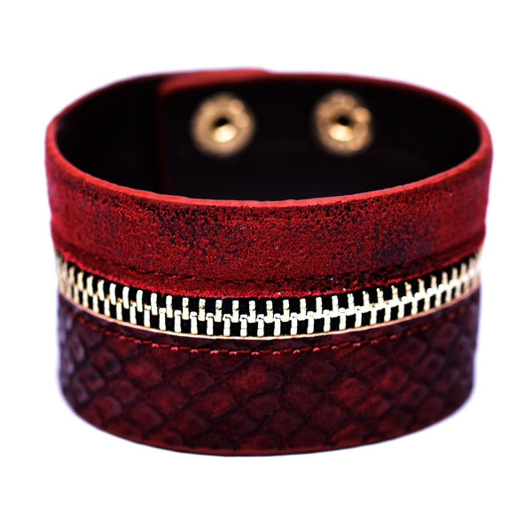Cuff style bracelet with zip effect feature
