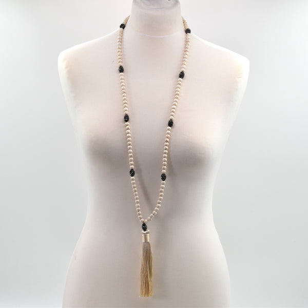 Tassel pendant long necklace with white turquoise beads
