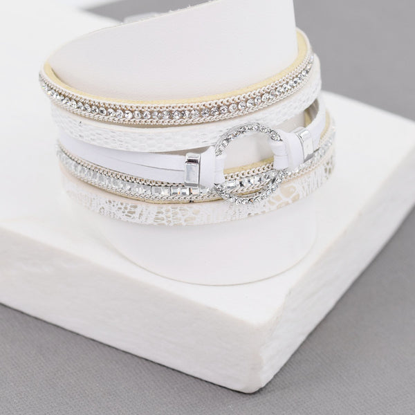 Multi strand bracelet with circle pendant