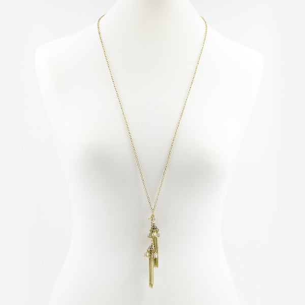 Long necklace with twin tassel pendants with crystals
