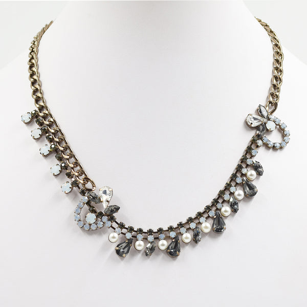 Statement necklace with multi crystal and pearl details