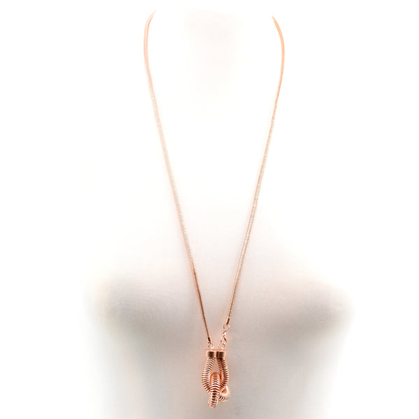 Long snake chain necklace with unusual knotted pendant