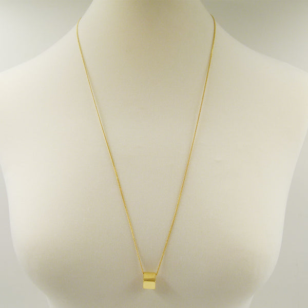 Delicate long necklace with geometric cube style pendant