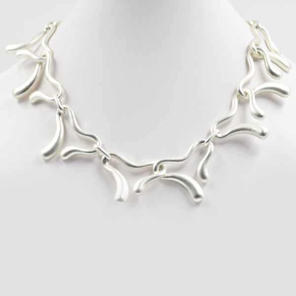 Contemporary organic shapes linked necklace