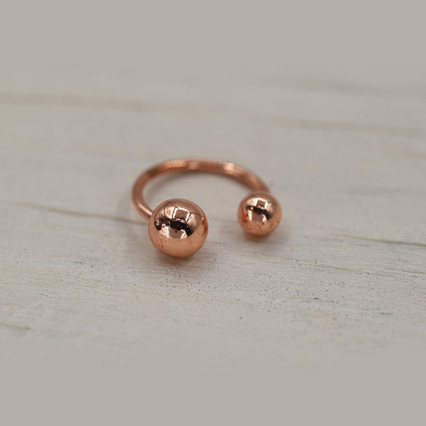 Delicate double ball ring